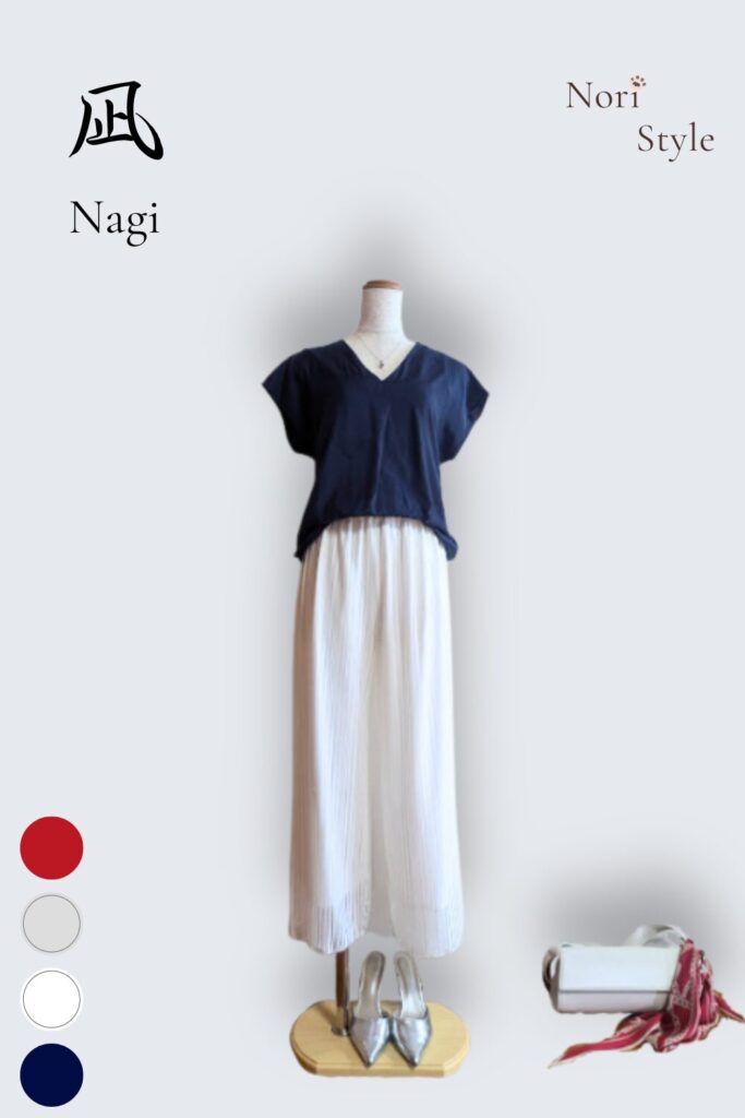 深く落ち着いたネイビーに、風をはらんで揺れるホワイトのシアーパンツを合わせた、究極の引き算スタイル。まるで穏やかな夏の海を眺めているときのように、波立つ心をすーっと静めてフラットに戻してくれる、クリーンで知的な「凪」のコーディネートです。